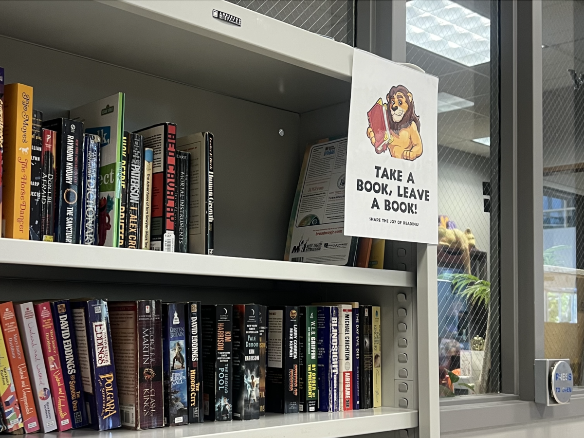 The "Take a Book, Leave a Book" bookshelf sits beside the University Center Operations and Event Management Office, allowing students to access reading materials and donate books they wish for others to have access too.